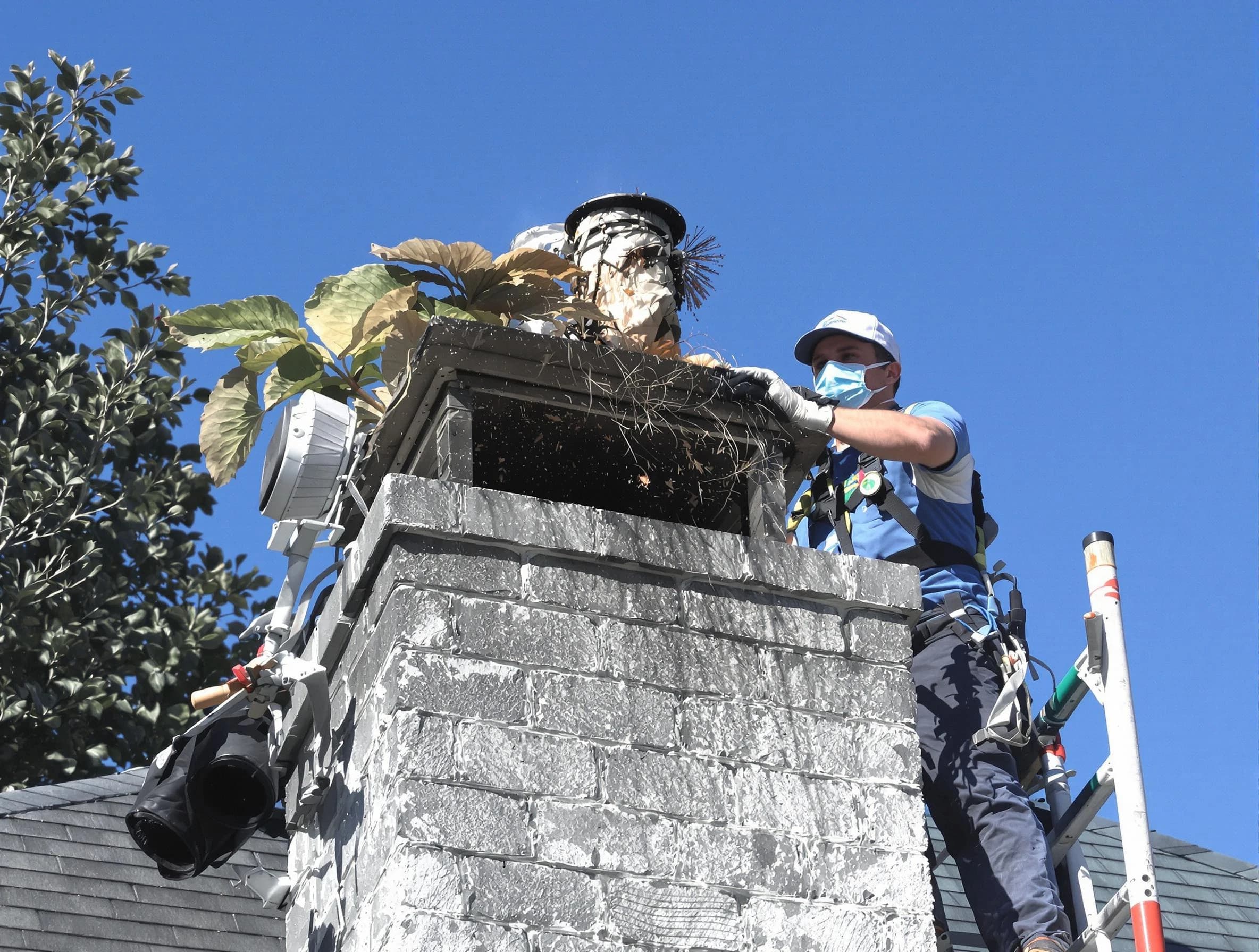 Plainfield Chimney Sweep specialist performing chimney cleaning in Plainfield, NJ